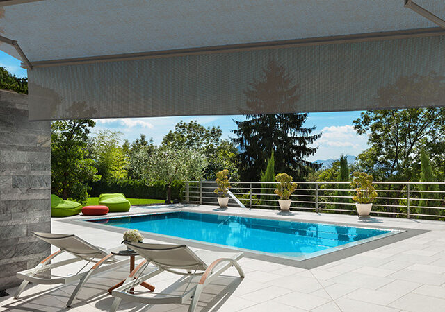 Folding-arm-awning-with-swimming-pool